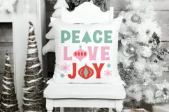 Peace Love Joy SVG on a throw pillow