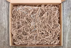 Mock-up of Giftbox W Crinkle Tissue Product Image 3