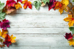 Autumn leaves on wooden background Product Image 1