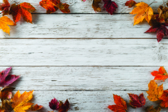 Autumn leaves on wooden background Product Image 1