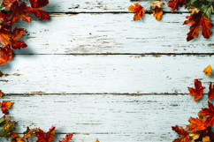 Autumn leaves on wooden background Product Image 1