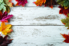 Autumn leaves on wooden background Product Image 1