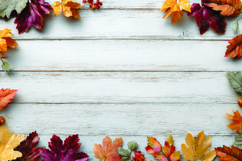 Autumn leaves on wooden background Product Image 1