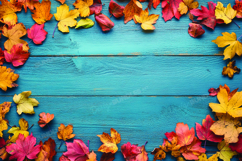 Autumn leaves on wooden background Product Image 1