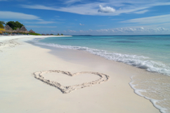 Sand Heart on Beach Background Wallpaper Product Image 1
