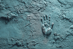 Handprint Impression on a Rough Textured Surface Background Product Image 1