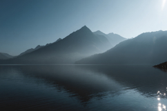 Misty Lake with Mountains Background Wallpaper Product Image 1
