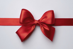 Red Bow Tied with White Background Wallpaper Product Image 1