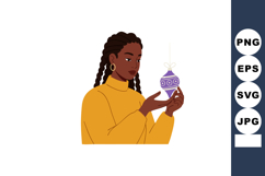 Woman holding purple Christmas tree ornament in yellow sweat Product Image 1