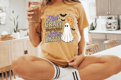 Retro Halloween PNG showing a white ghost beside distressed typography with bats, stars, and a full moon for spooky season apparel and crafts.