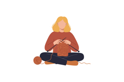 Woman knitting with orange yarn while sitting cross-legged i Product Image 1
