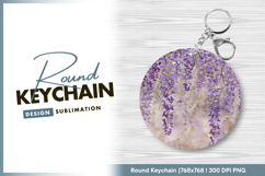 Hanging purple wisteria flowers over textured round keychain Product Image 1
