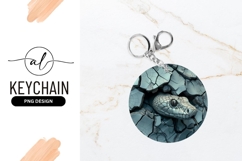 Snake Head Emerging From Cracked Stone Round Keychain P N G Product Image 1
