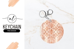 Elegant round keychain with rose gold floral design Product Image 1