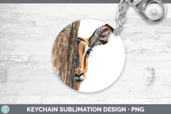 GorgeousSafari Tree Peek Keychain design.
