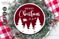 Santa's sleigh silhouette flying over evergreen tree Silhouette on Christmas night with Merry Christmas text on a red round sign