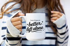 Sarcastic quote SVG with large script “better left alone,” smaller text above and below, and decorative sparkles; clean black design for decals and shirts.