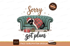 Black cat sleeping on couch wearing Santa hat image Product Image 1
