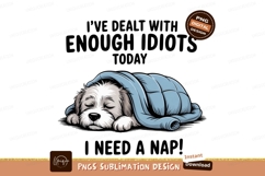 Fluffy dog sleeping under blue blanket puppy Product Image 1