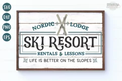 Farmhouse ski resort sign with hand-drawn skis shown on a white shiplap sign with a wooden frame