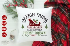 Old Fashioned Sleigh Rides text featuring a drawn red sleigh shown on a white square pillow