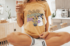 Sublimation PNG design of a ghost gardener holding a purple watering can beside carnivorous flowers with vintage Halloween aesthetics.