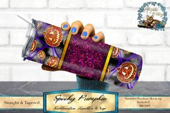 This is a Spooky pumpkin sublimation design. sized to fit a 20oz skinny tumbler. This sublimation tumbler wrap features a glitter band and peekaboo pumpkins