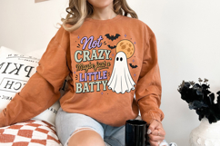 Funny Halloween sublimation design with a smiling ghost, flying bats, moon illustration, and playful retro lettering in muted seasonal colors.