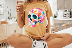Digital PNG featuring one complete colorful skull design with bold brush strokes, teal eye sockets, white teeth, and playful painted details.