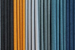 Folded and hanging cloth samples background Product Image 1