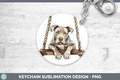 GorgeousSwinging Dogs Keychain design.