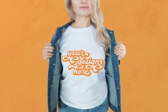 White t-shirt woman model mockup on orange background Product Image 1