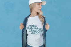 White t-shirt woman model mockup on blue background Product Image 1