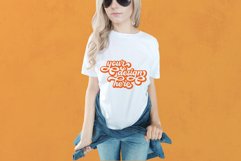 White t-shirt woman model mockup on orange background Product Image 1