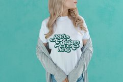 White t-shirt woman model mockup on teal background Product Image 1