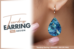 Christmas ornaments on pine branch blue teardrop earring png Product Image 1