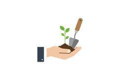 Hand holding soil with a small green plant and gardening tro Product Image 1