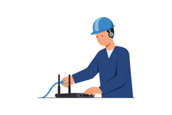 Technician connecting cables to router wearing safety helmet Product Image 1