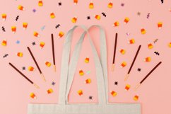 <img src="tote-bag-mockup-featuring-halloween-candy.png" alt="tote bag mockup featuring halloween candy">