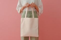 Woman Holding Canvas Tote Bag Product Image 1