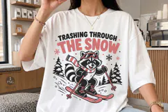 Trashing through the snow PNG, Funny raccoon t-shirt graphic Product Image 2