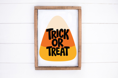 Halloween craft graphic featuring a rounded candy corn shape, warm seasonal colours and playful black Trick or Treat lettering.