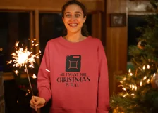 ugly-xmas-sweater-mockup-of-a-happy-woman-with-a-sparkler with quote All I want for Christmas is Fuel