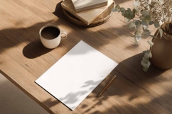 Blank White Paper on Wooden Table Product Image 1