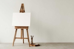 Wooden easel with a white canvas Product Image 1