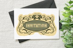 vintage floral frame on invitation with black envelope