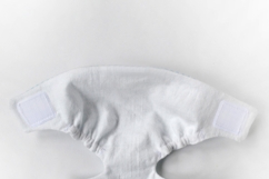 Diaper for 14-15 inch (36-38 cm) Waldorf baby doll, including printable PDF sewing pattern and step-by-step tutorial for creating handmade doll clothes and accessories, perfect for DIY projects.