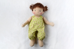 DIY romper for 14-15 inch (36-38 cm) Waldorf doll, including printable PDF sewing pattern and step-by-step tutorial for creating handmade doll outfits, perfect for DIY sewing projects and gifts.