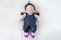 DIY romper for 14-15 inch (36-38 cm) Waldorf doll, including printable PDF sewing pattern and step-by-step tutorial for creating handmade doll outfits, perfect for DIY sewing projects and gifts.