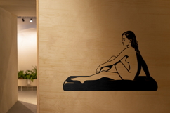 Nude Woman Sitting on Couch Product Image 3